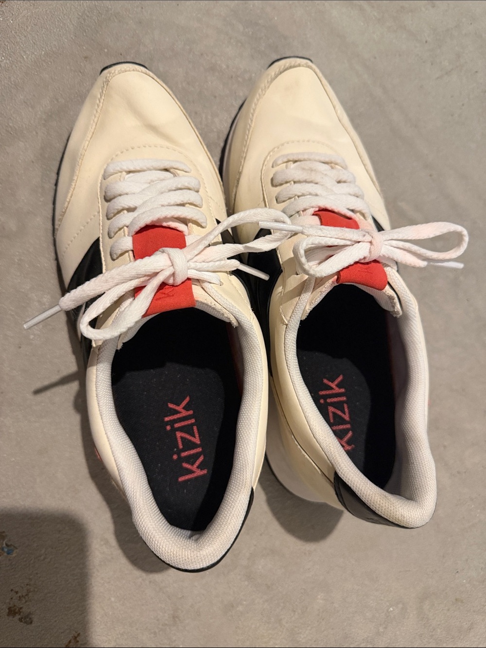 Kizik Women's Cream and Black Sneakers with Red Tongue Accent